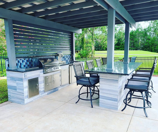 Amazing Poolside Outdoor Kitchen with Dual Islands, Modern Pergola, and Windbreak