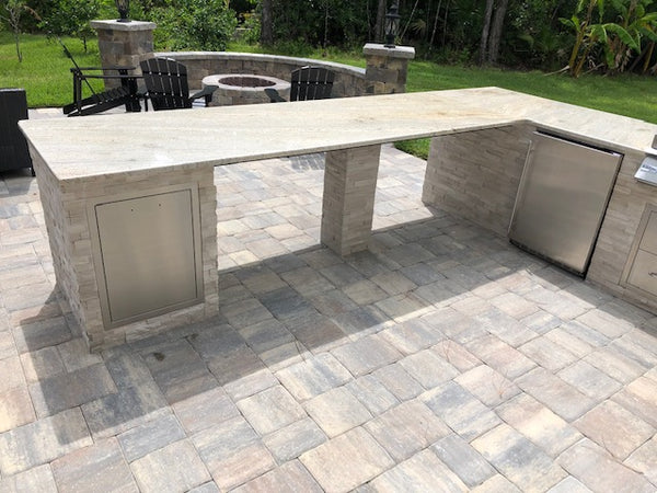 Expansive Outdoor Kitchen, Built-in Custom Fire Pit Area, and Stone Patio in North Florida