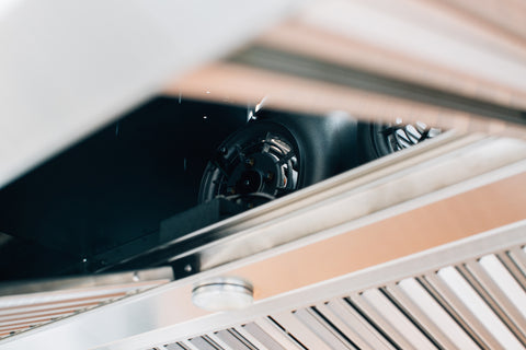 The vent hood removes the smoke from your grilling area